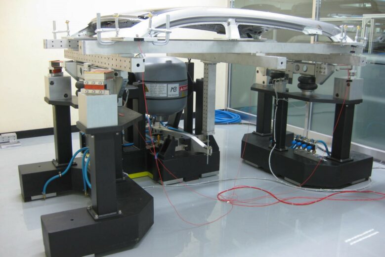 3 axis test system testing an automotive roof frame assembly